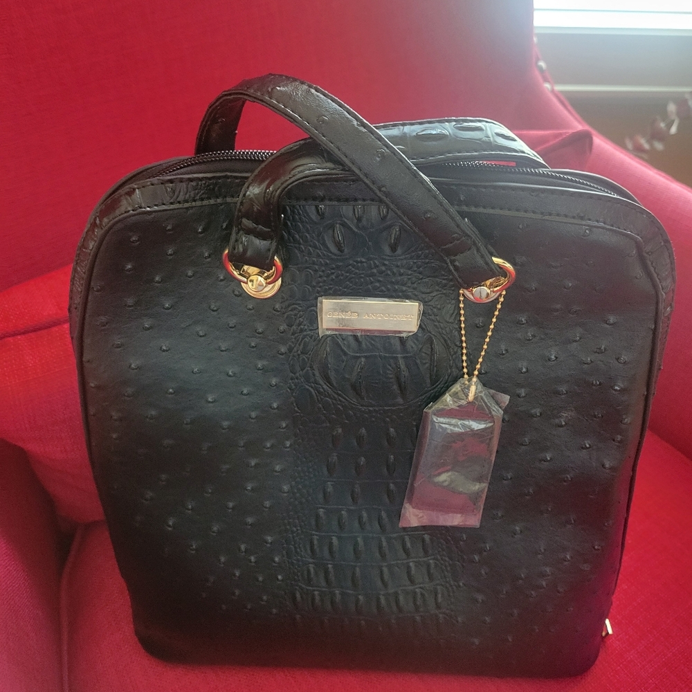 Black leather purse/backpack/ handbag for laptop, travel or every day.